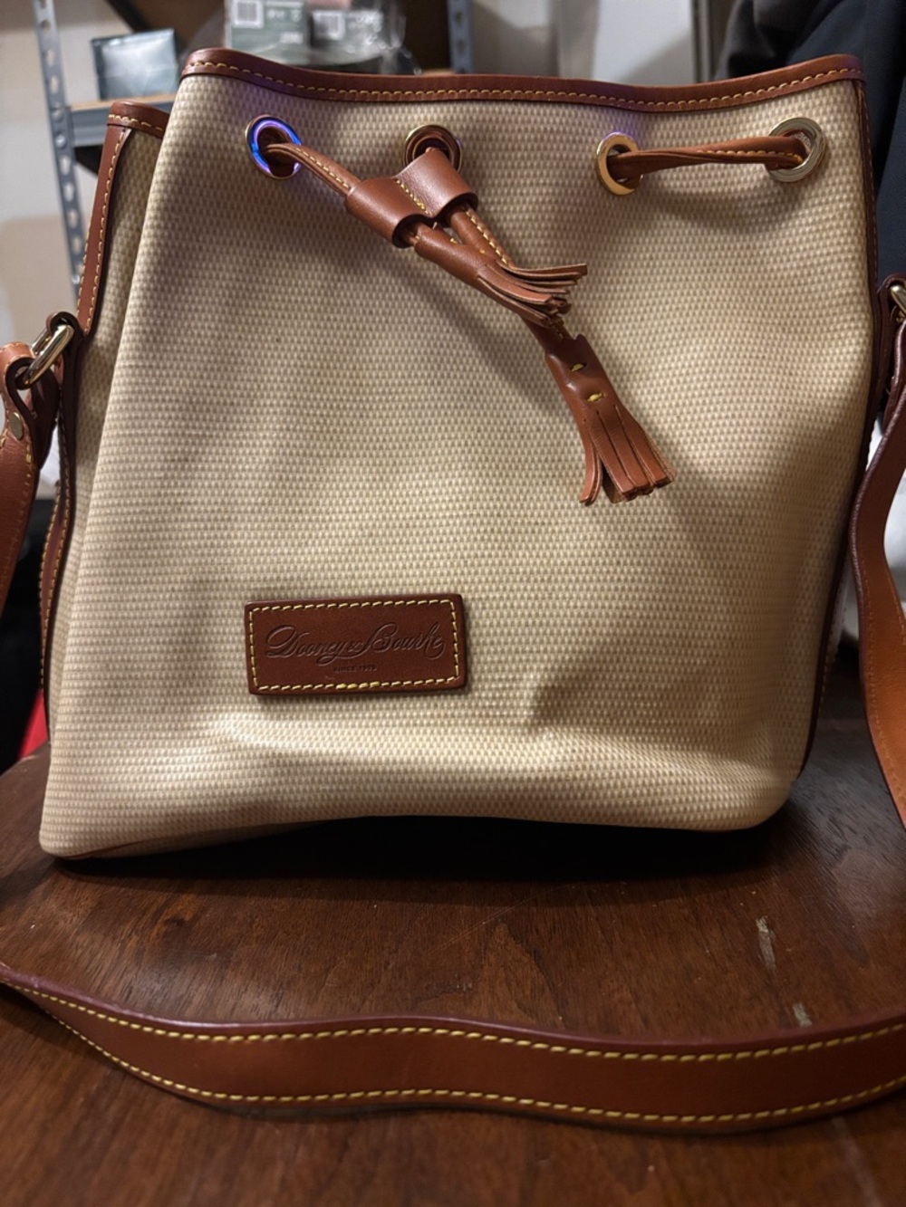 Dooney & Bourke Cream Canvas Drawstring Crossbody with Brown Leather Trim